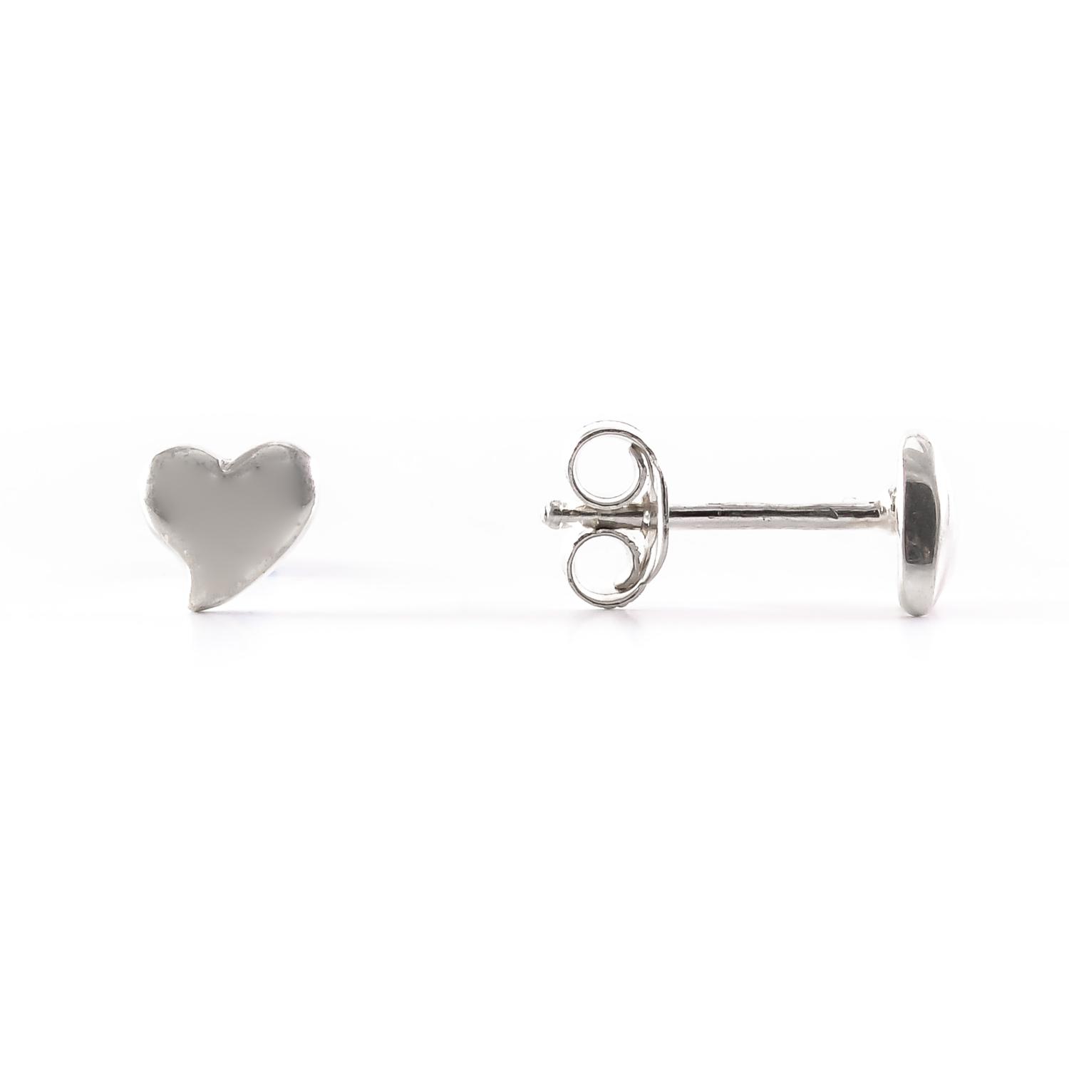 Heart - shaped studs in sterling silver