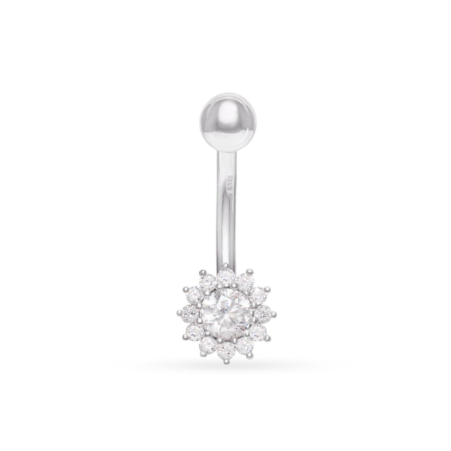 White gold belly button piercing with a flower-shaped element