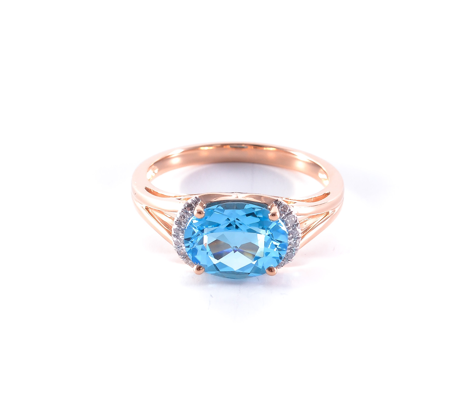 Gold ring with topaz and diamonds