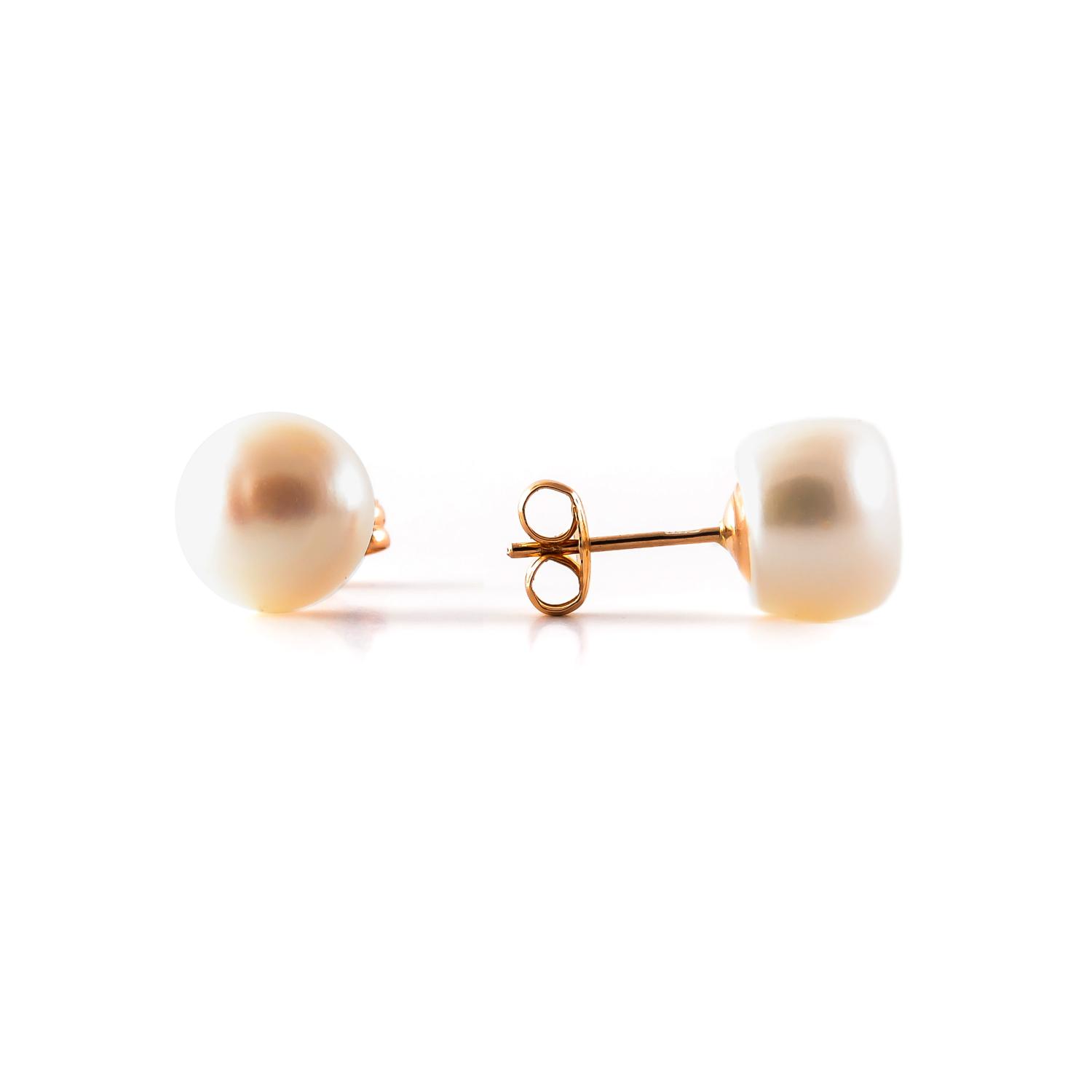 Gold stud earrings with pearl