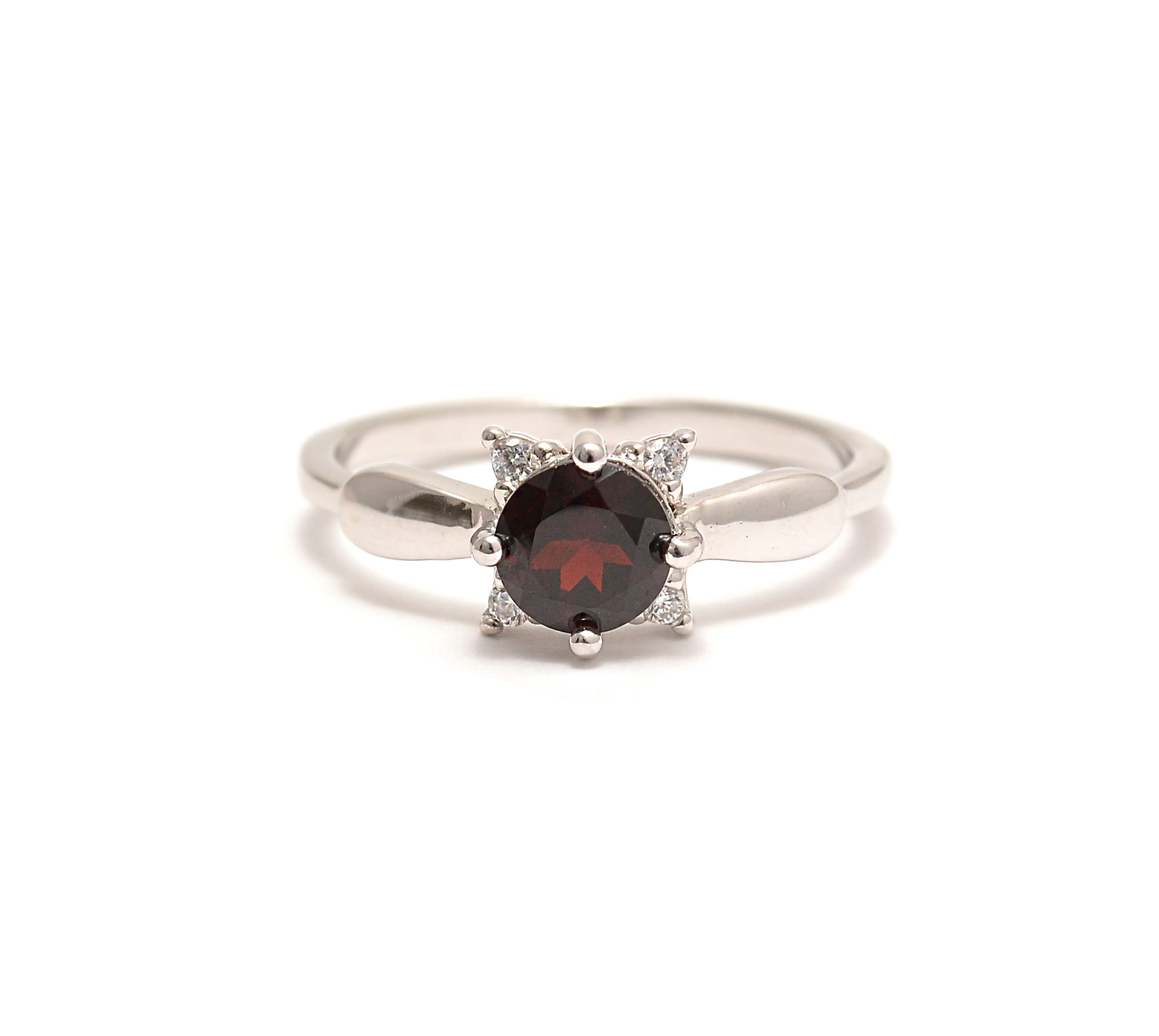 Silver ring with garnet