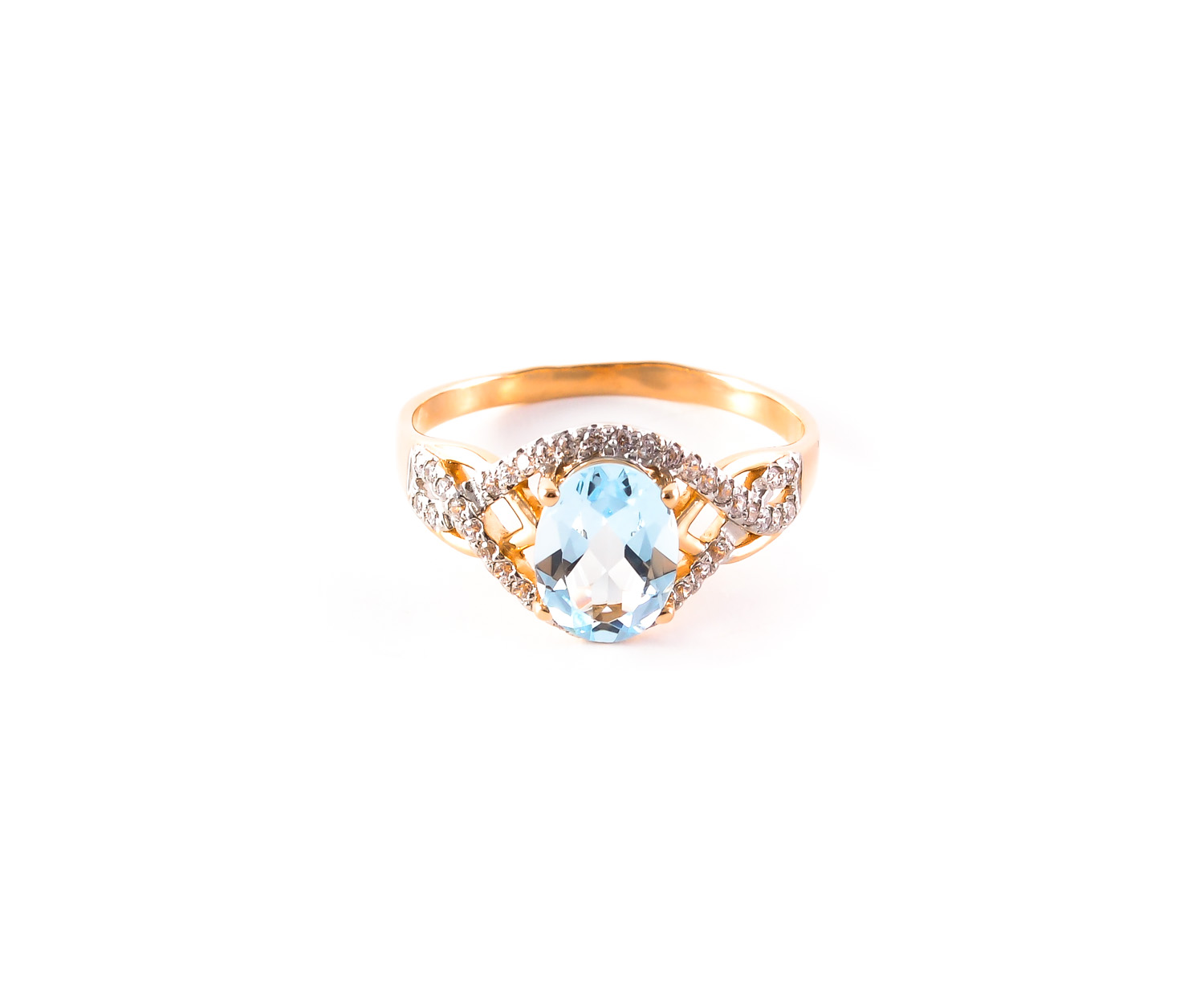 Gold ring with light blue topaz 