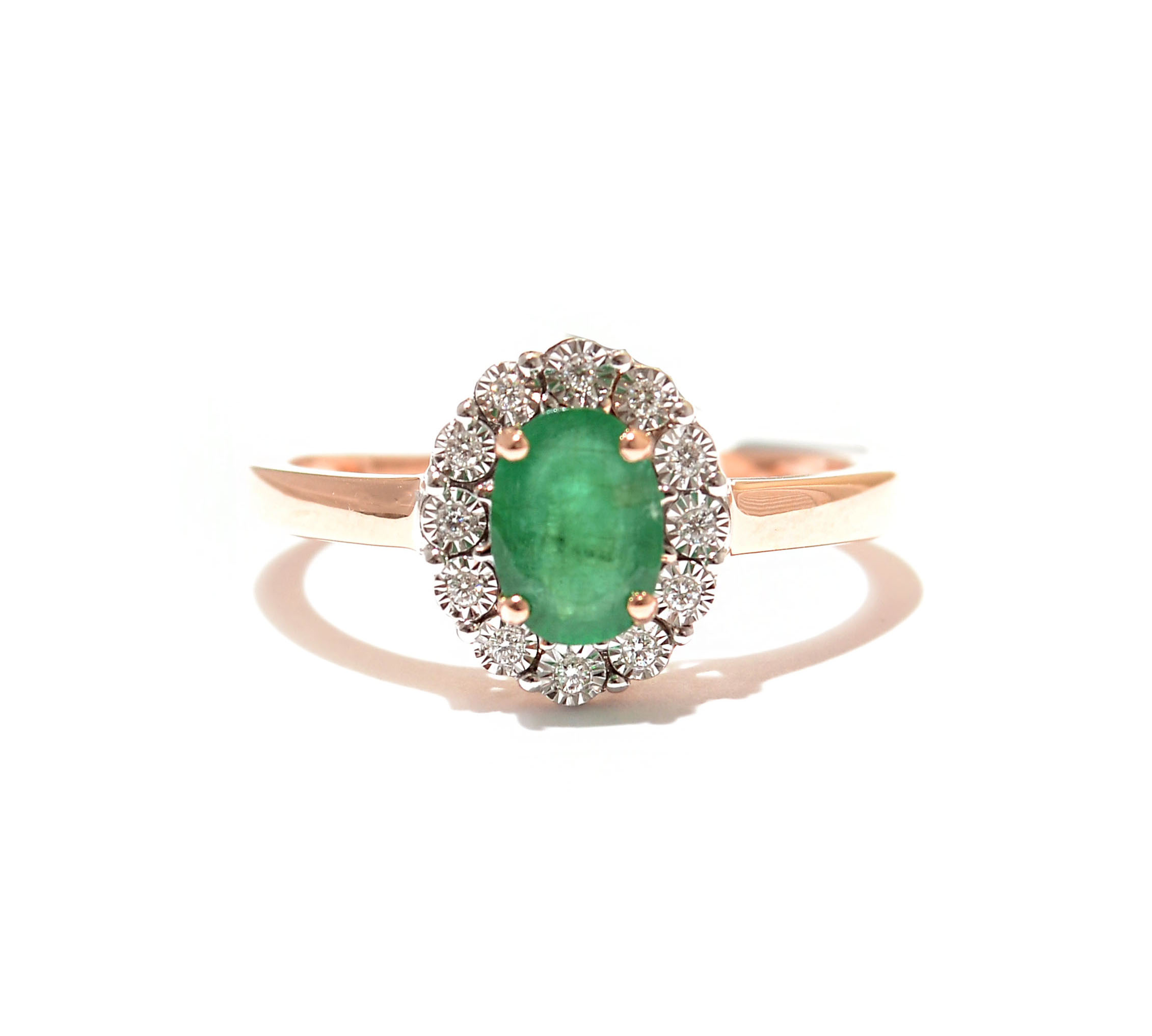Gold emerald ring with diamonds