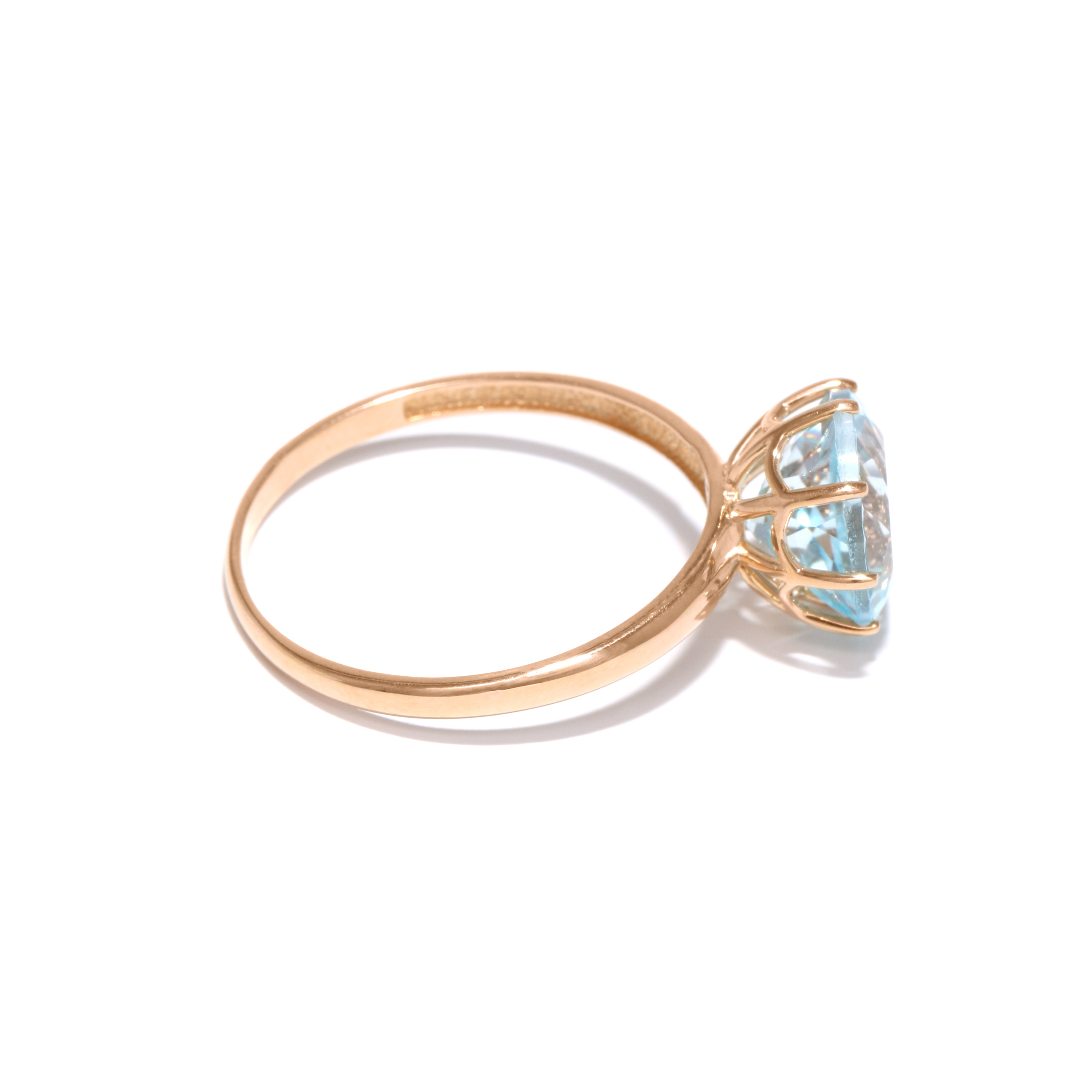 Gold ring with topaz