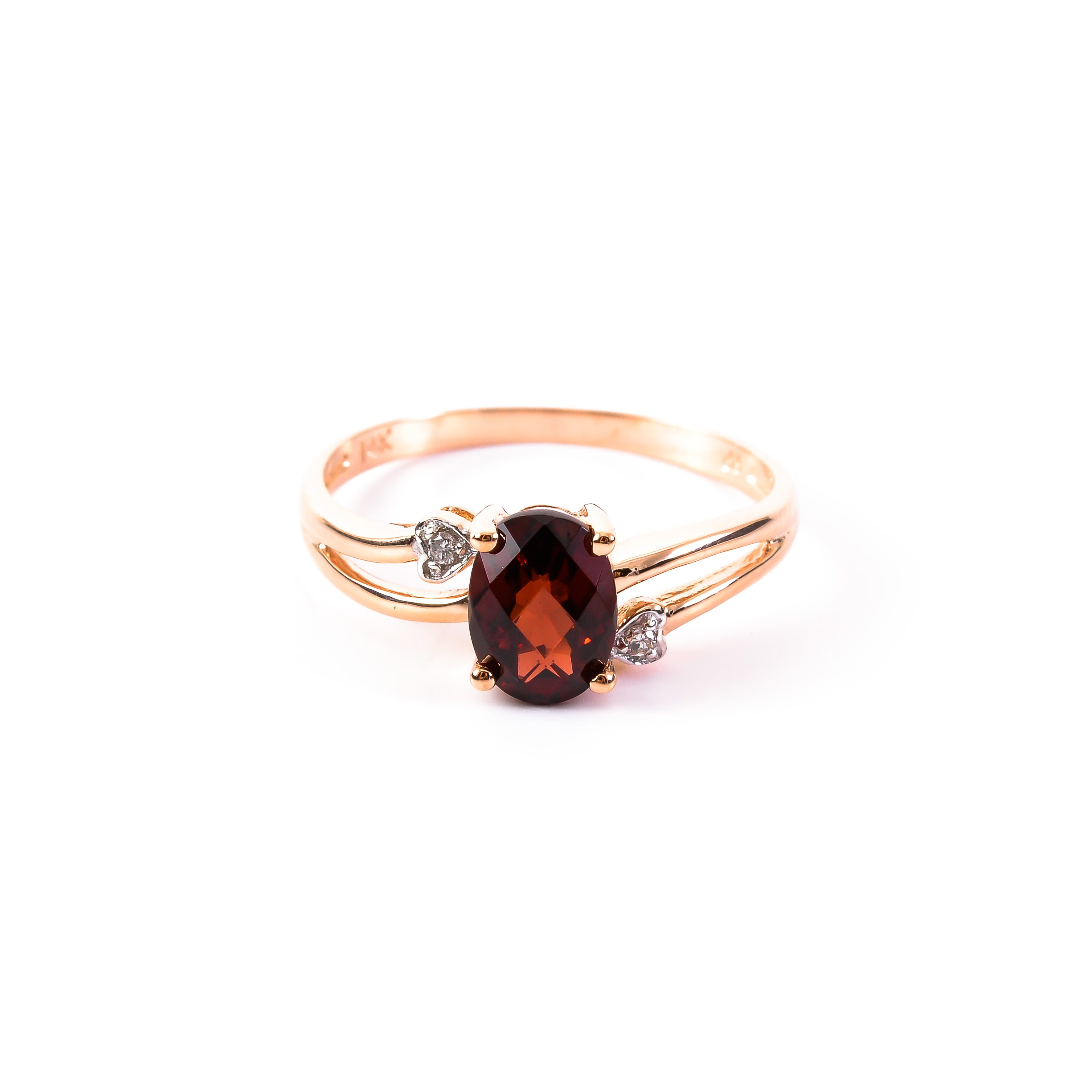 Gold garnet ring with diamond