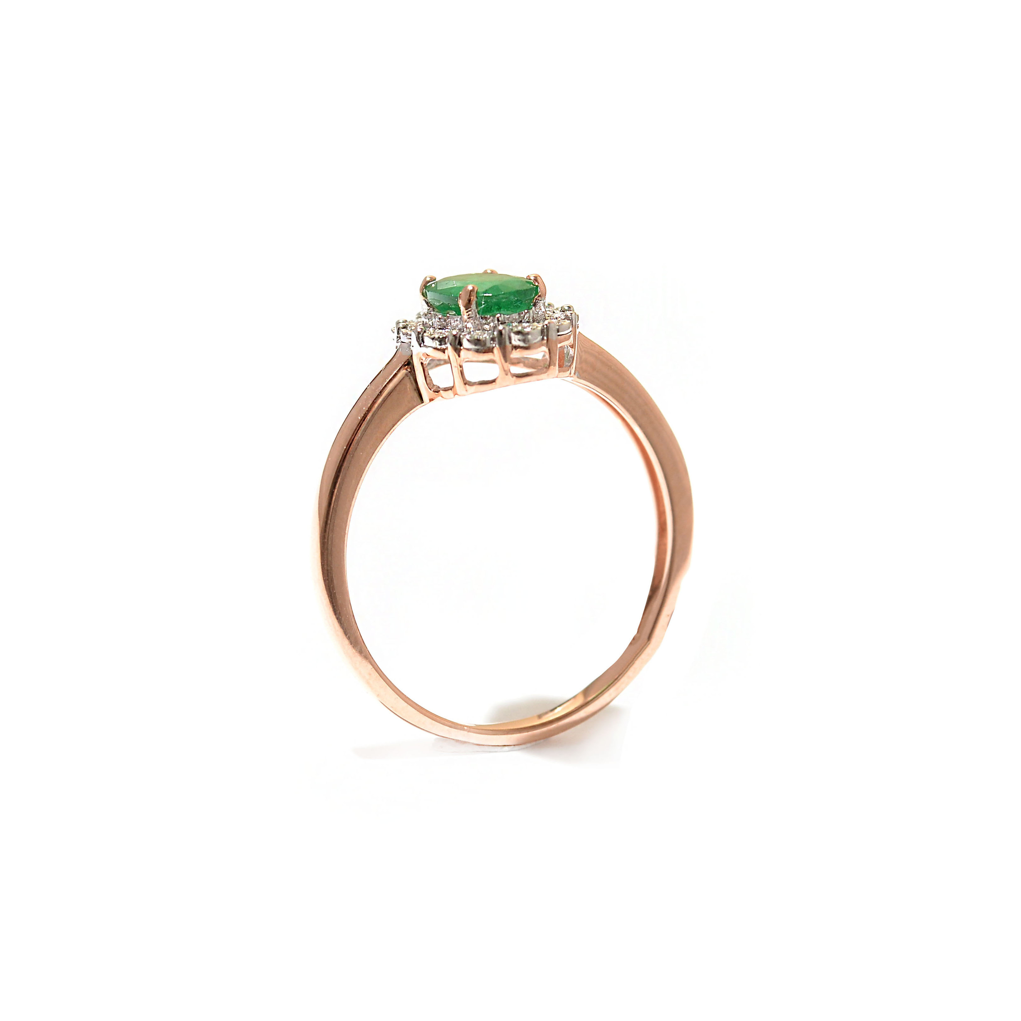 Gold emerald ring with diamonds